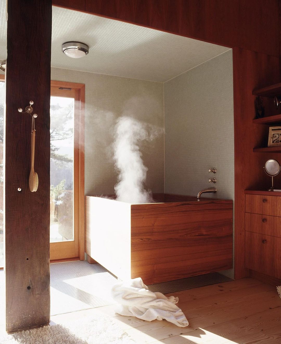Luxurious Bathtub with steam rising at Waterfall House