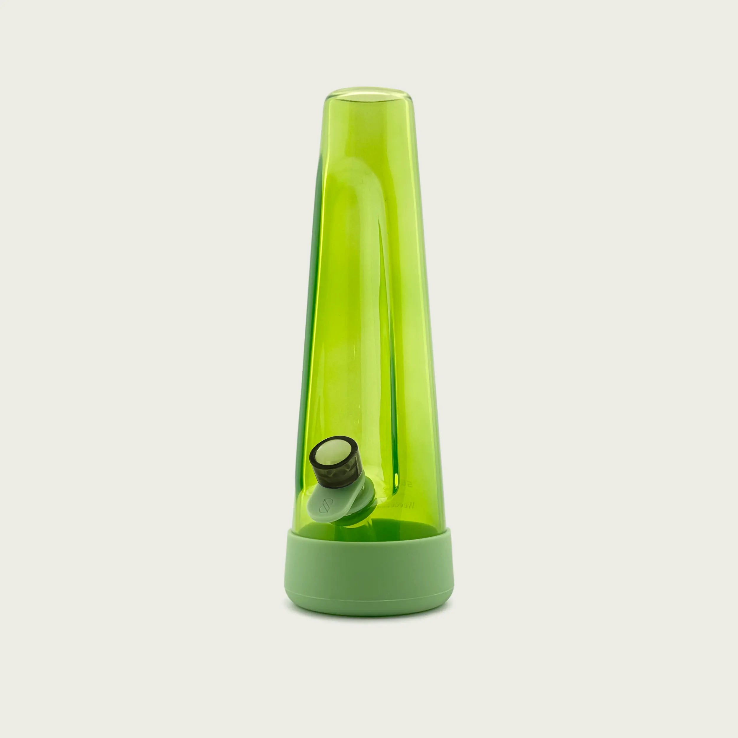 Studio shot of the Designer Series Grass Bong by Session Goods, featuring translucent green glass and pastel green silicone base