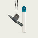Discreet and stylish one-hitter with black chain, paired with a dream blue stash tube – perfect for travel.