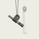 Session Goods one-hitter with a modern black chain and memory off-white stash tube for on-the-go use.