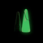 Modern portable pipe in Green Aura colorway, with a glow-in-the-dark silicone sleeve, shown in a clean studio setting on a black background