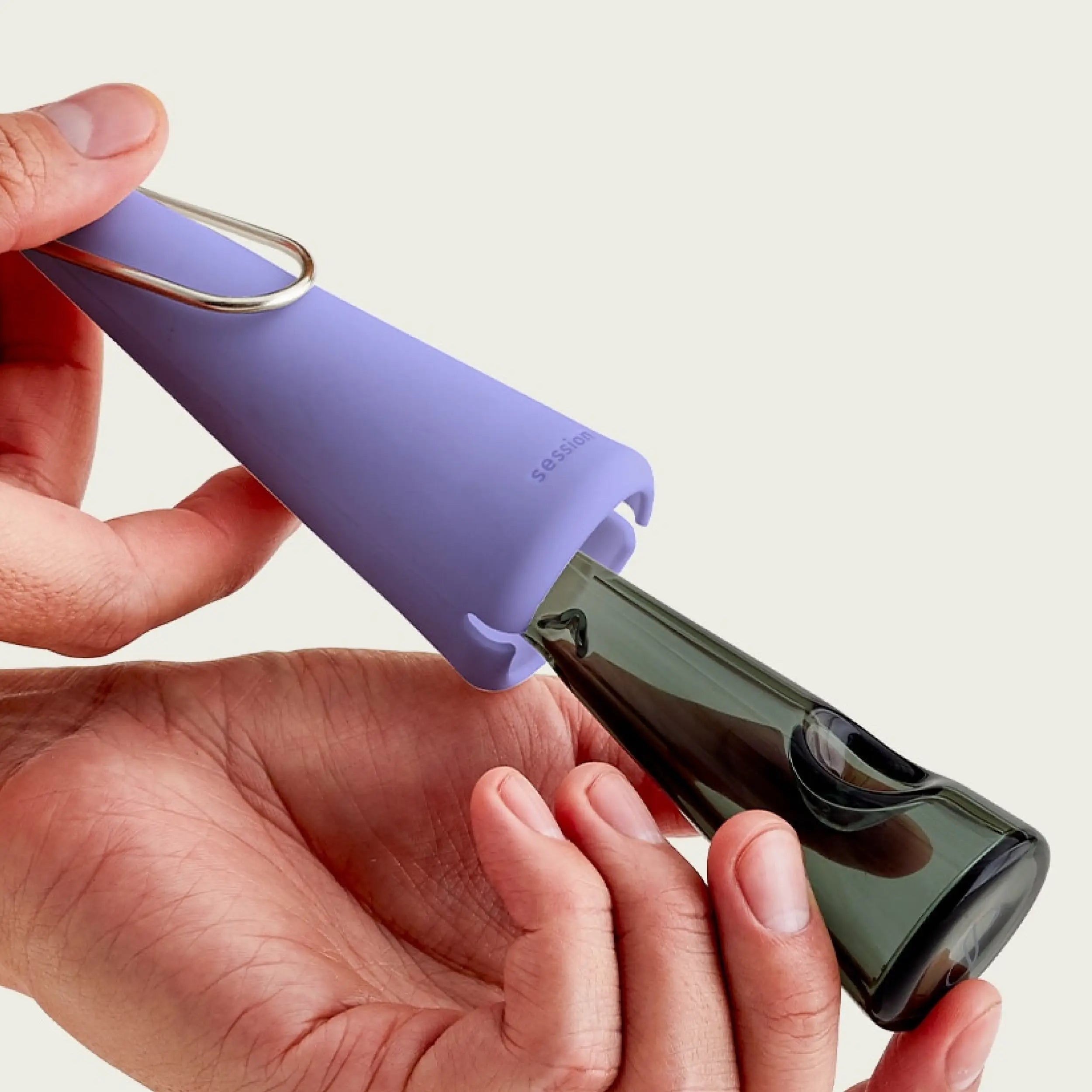 silicone sleeve holds durable glass pipe on-the-go and keeps it safe