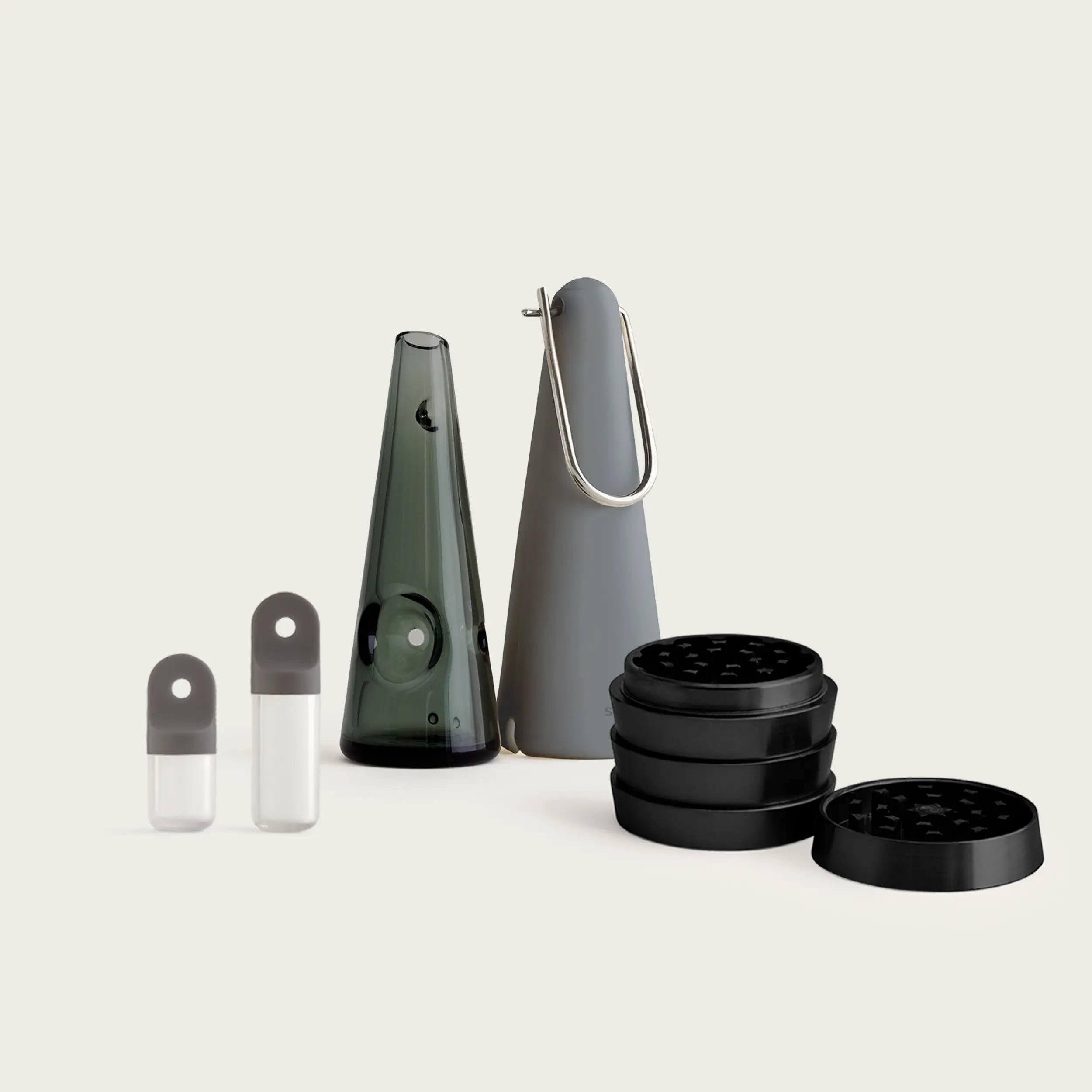 premium on-the-go travel kit, high quality borosilicate glass pipe with silicone carry sleeve, airtight premium ashtray and portable stash pods.