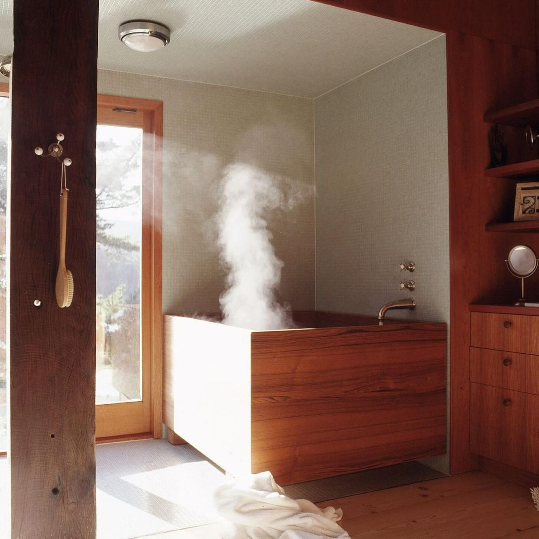 Luxurious Bathtub with steam rising at Waterfall House