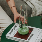 A close-up of the Desire Green Bong, featuring intricate design details and a vibrant green hue.