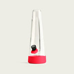A minimalist clear glass Session Goods bong standing upright, featuring an ergonomic indented design, a cherry red silicone protective base, and a black bowl piece with a red silicone tab.