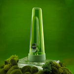Green glass bong with a base on a green background