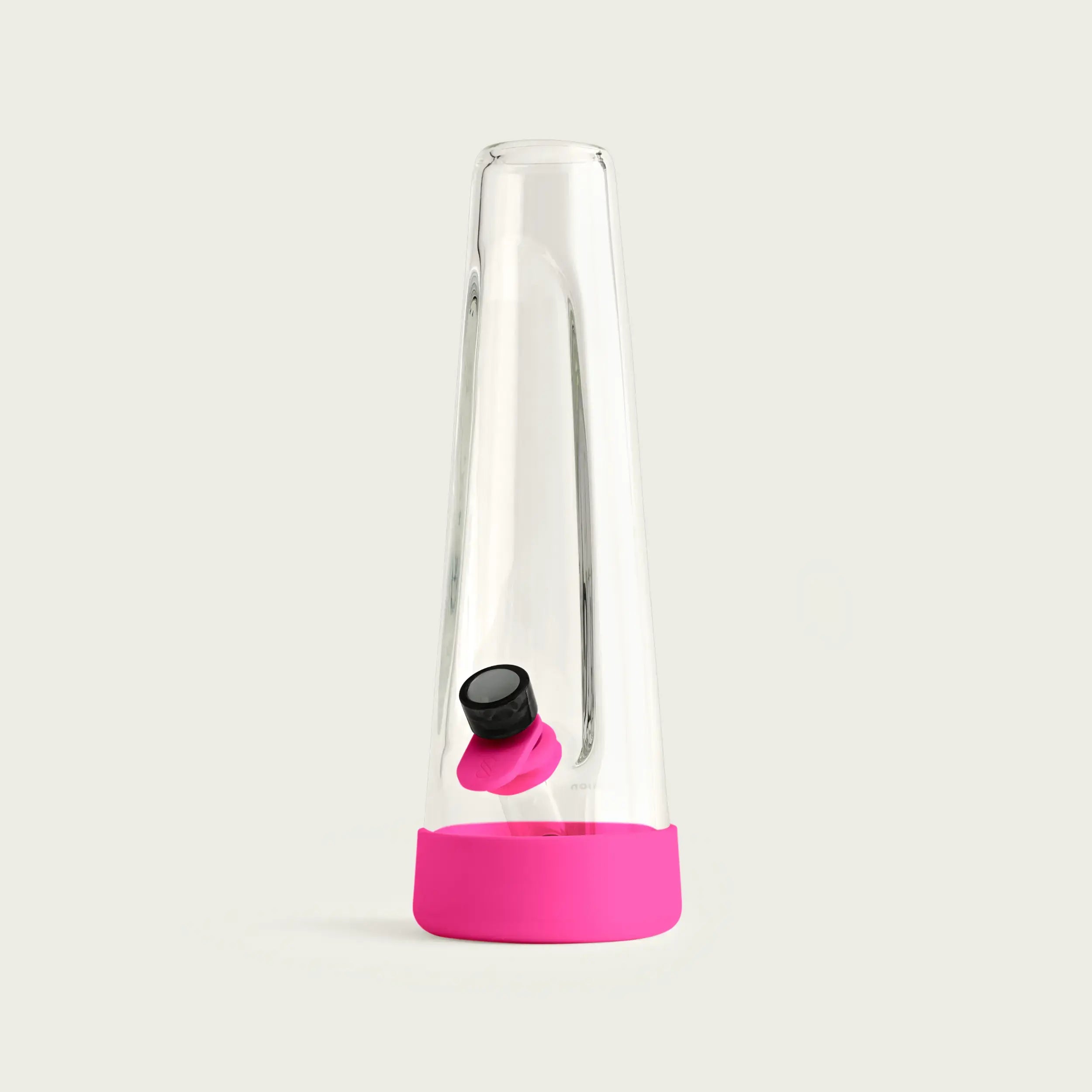 architectural studio shot of the Session Bong at a slight angle, showcasing the seamless integration of the Magenta Pink silicone accessories against the minimalist glass silhouette.