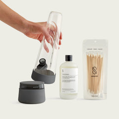 Session Goods starter bundle featuring; Sleek Charcoal Bong, stash jar, and cleaning kit