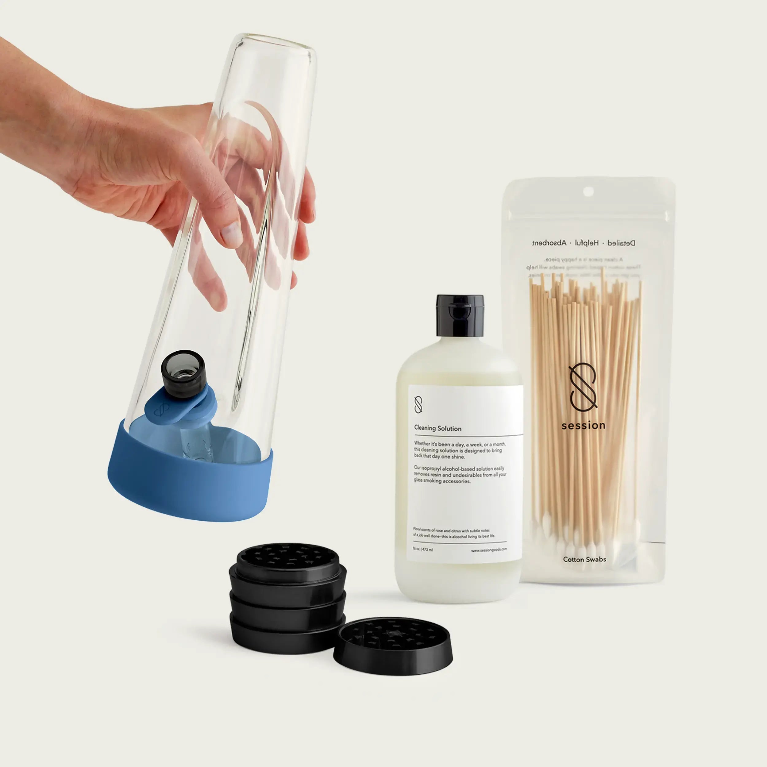 The Indigo Blue Session Goods starter bundle with a blue-accented borosilicate bong and industrial grinder, styled as modern home decor.