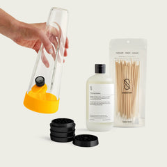 Paradise Yellow Session Goods starter bundle with a yellow-accented borosilicate bong and premium metal grinder, showcasing a bright, modern aesthetic.