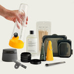 Scandinavian-inspired Paradise Yellow Session Goods bundle featuring a vibrant yellow glass bong and portable pipe set, displayed as a clean, architectural centerpiece for the home.