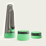 Session Goods 3-piece bundle in Designer Ash and Glow Green, showing a tapered smoky black glass bong, matching stash jar, and low-profile ashtray with mint green silicone protective bases and accents.