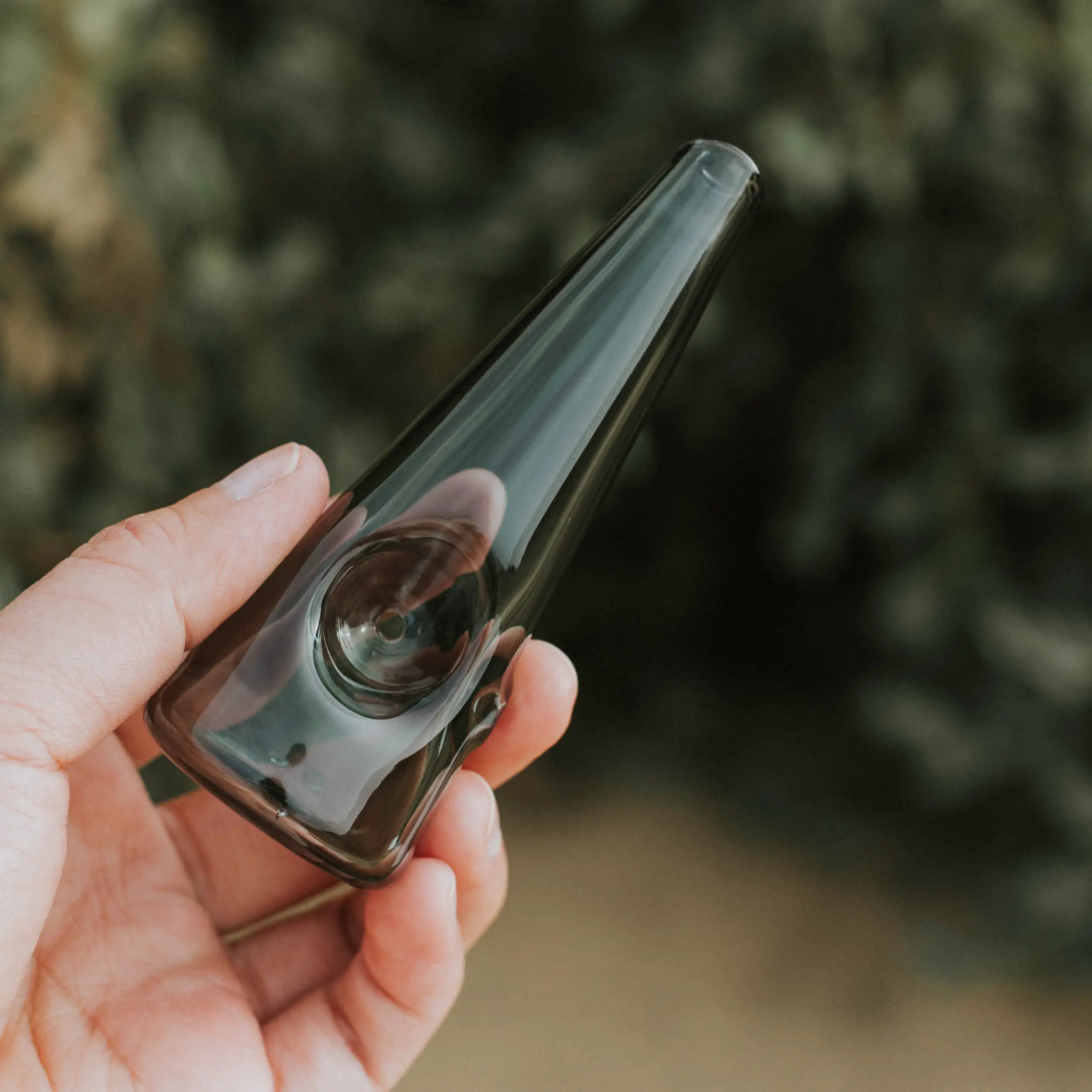 Glass pipe with orange silicone sleeve alongside a Cloud Bong and stash kit in the Fall Harvest Bundle.