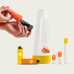 Fall Harvest Bundle featuring a Cloud Bong with yellow and orange silicone, a matching stash kit, two ‘It’s 420’ lighters, and a glass pipe with horizon orange sleeve.