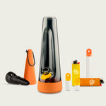 Session Goods Harvest Designer Ash Bong Bundle featuring the black glass bong with orange silicone base, black designer pipe, orange lighter carry case, and yellow 4:20 custom lighters and stash kit.