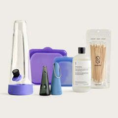 lunar frost bundle featuring a session modern glass bong in moonlight, portable indigo pipe, cleaning kit and silicone purple and blue cleaning pouch