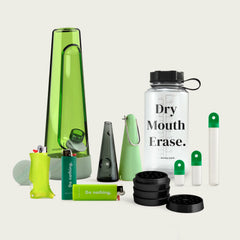 glow-in-the-dark green glass bong & pipe. the ultimate bundle also includes bong, pipe, water bottle, stash kit, grinder and lighters
