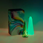 Glow-in-the-dark silicone, with a elegant green glass hand pipe in Glow Featured 2. a collaboration between session goods and weedfeed