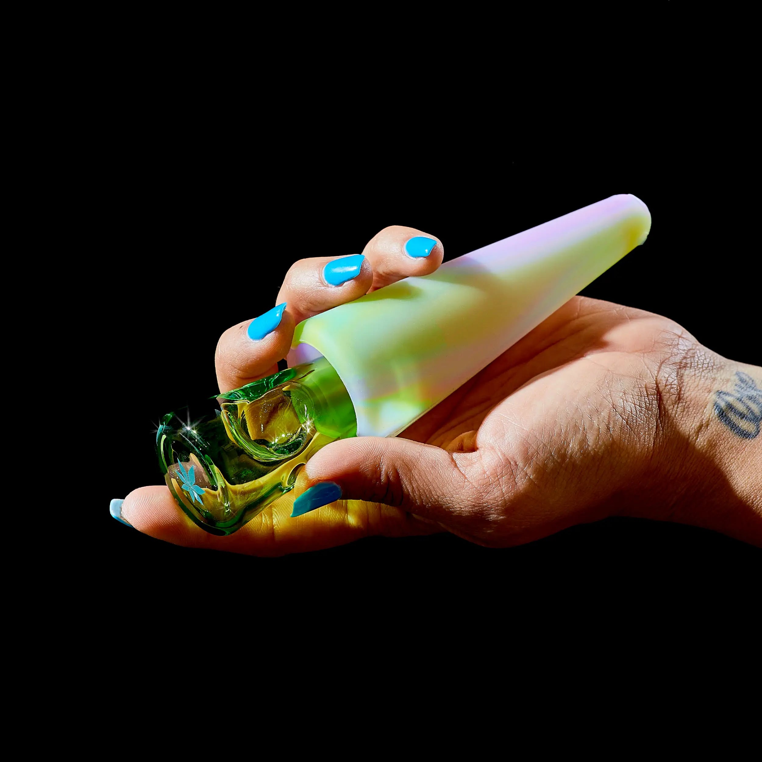 a green tinted glass portable pipe with a glow-in-the-dark silicone case. A limited edition collaboration between Session Goods and Weedfeed