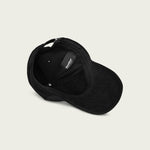 Comfortable black corduroy dad hat with minimalist ‘Do Nothing’ text.