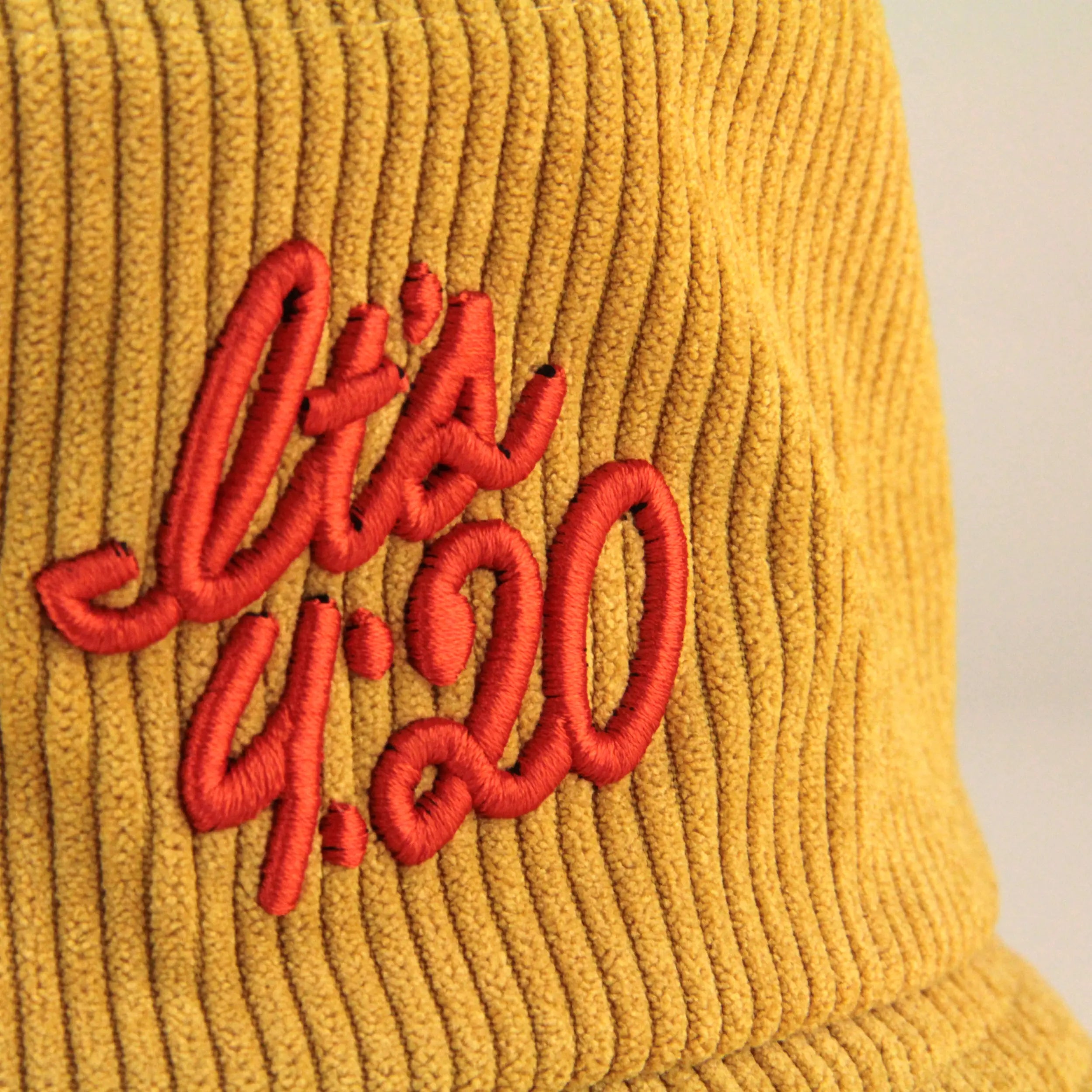 Close-up of the It’s 420 embroidery on a soft corduroy bucket hat by Session Goods