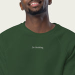 Close-up of ‘Do Nothing’ embroidery on a green Session Goods sweatshirt.