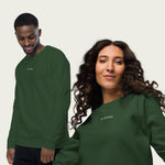 Cozy green sweatshirt with minimalist ‘Do Nothing’ message embroidered on the front.