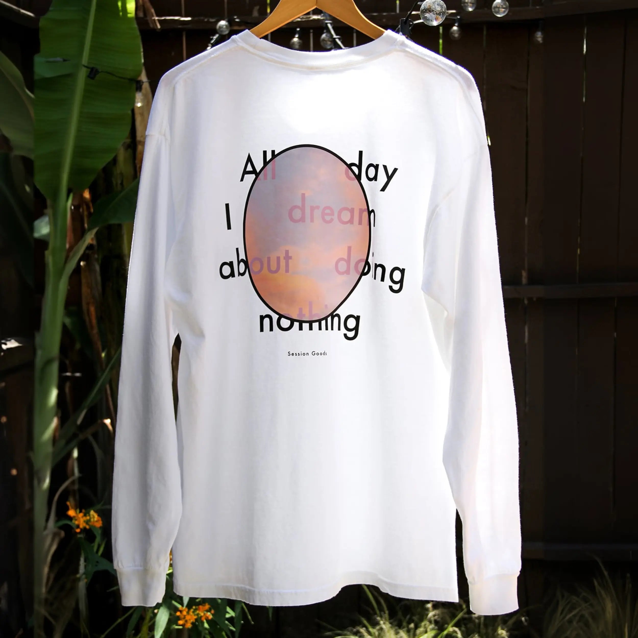 Cozy vibes: Relax in our 'All Day I Dream About Doing Nothing' long sleeve tee.