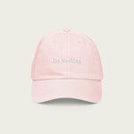 Chill vibes only with Session Goods! Our pink hat with the 'do nothing' slogan is the perfect accessory for laid-back moments. 🧢✨ #SessionGoodsStyle