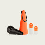 Session Goods Ash Black Pipe with a spooky orange silicone sleeve on a white background.